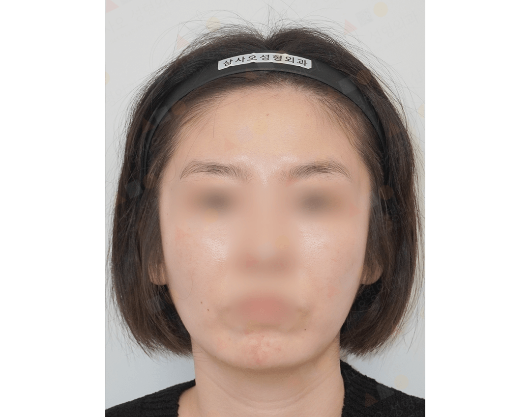 Person wearing black headband with Korean text