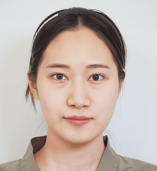 Person with headband looking forward.